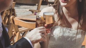Couple drinking beer for wedding day