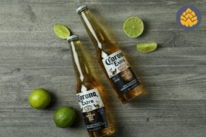 two corona beers with limes